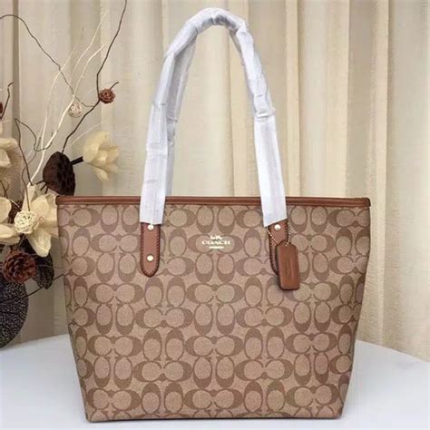 harga tas coach daisy original